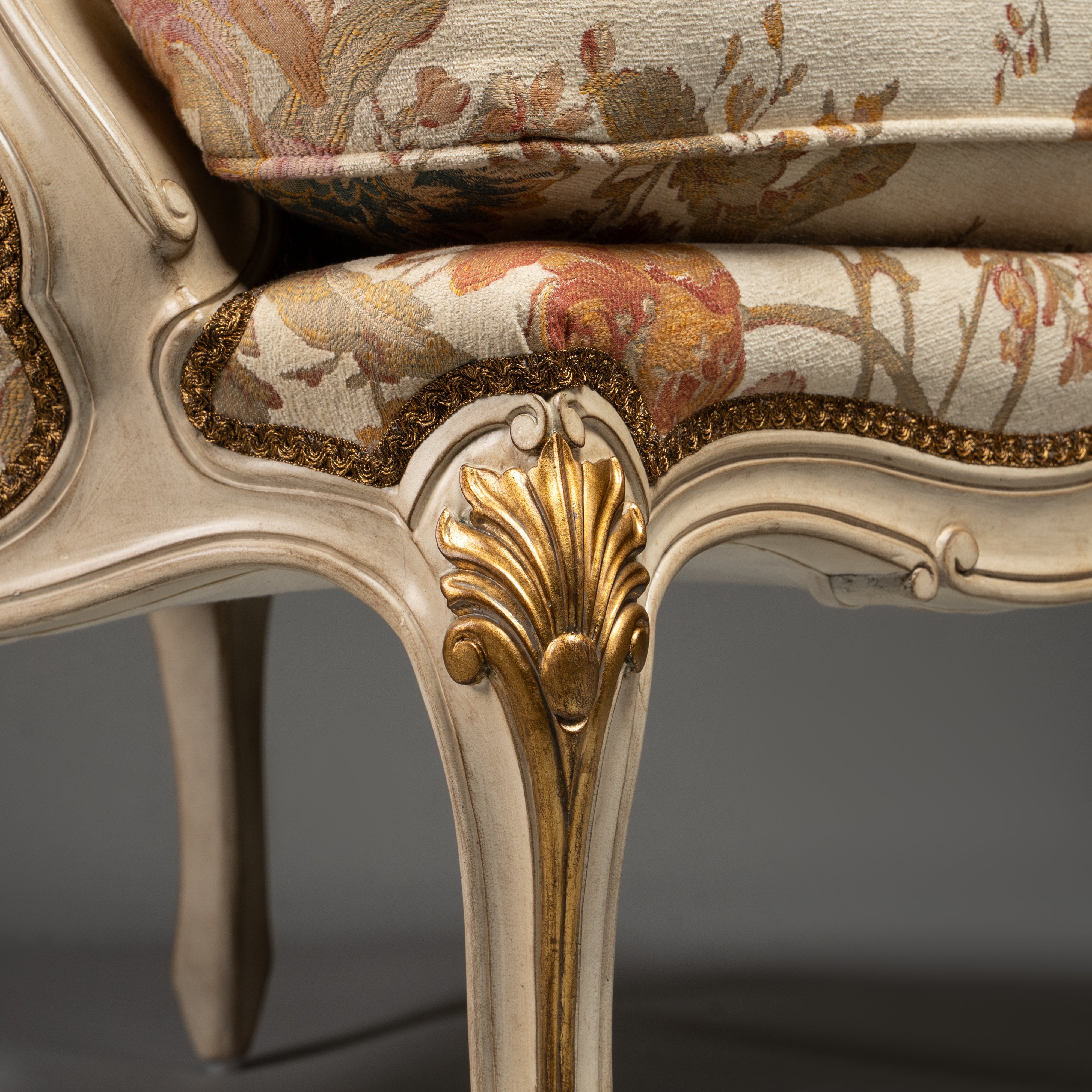 Louis XV-Style Bergère Armchair with Floral Upholstery and Gilded Accents