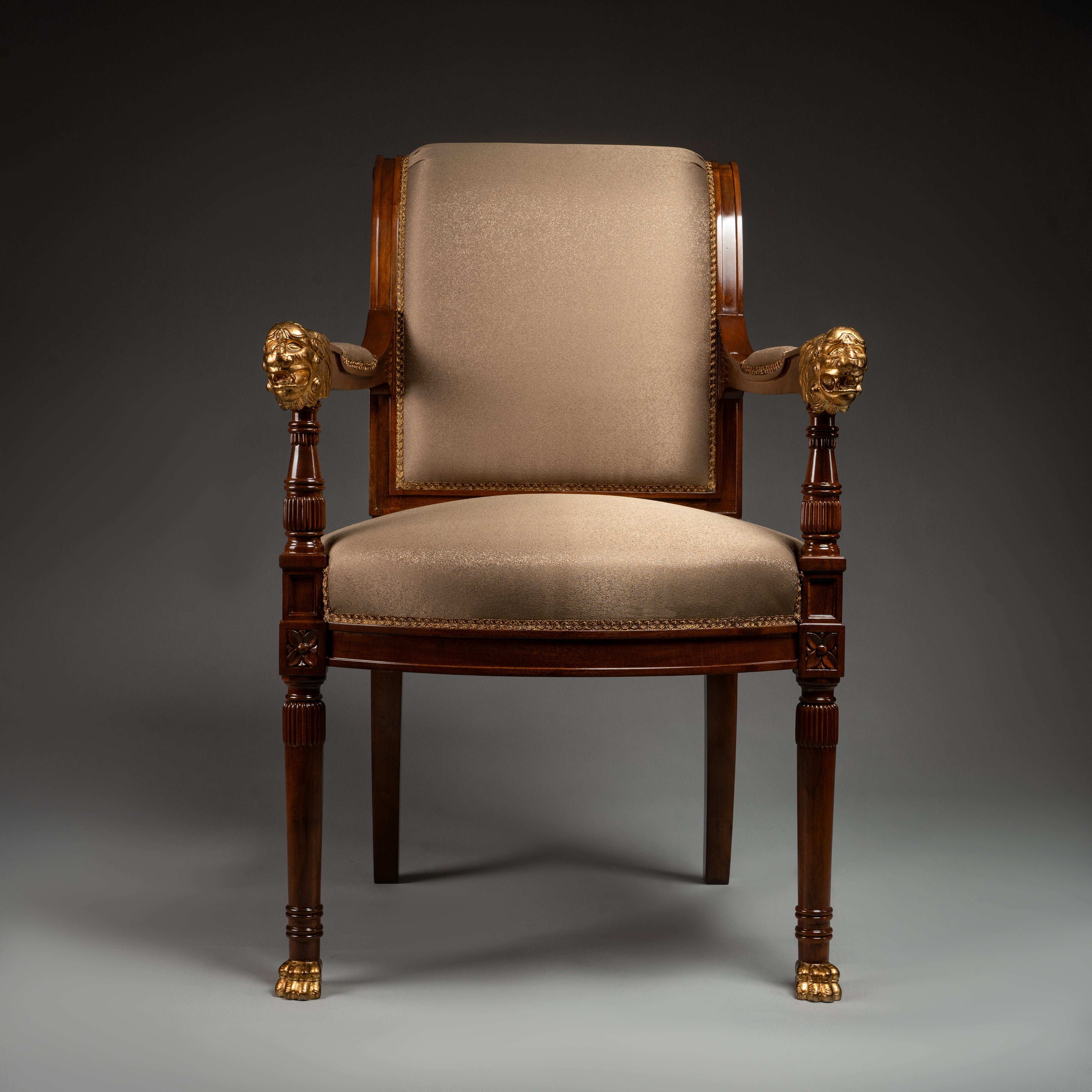 Empire-Style Mahogany Armchair with Gold Lion Head and Paw Details