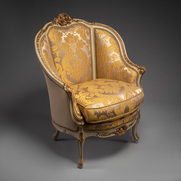 Vintage Louis XV-Style Armchair with Ornate Carvings and Golden Upholstery