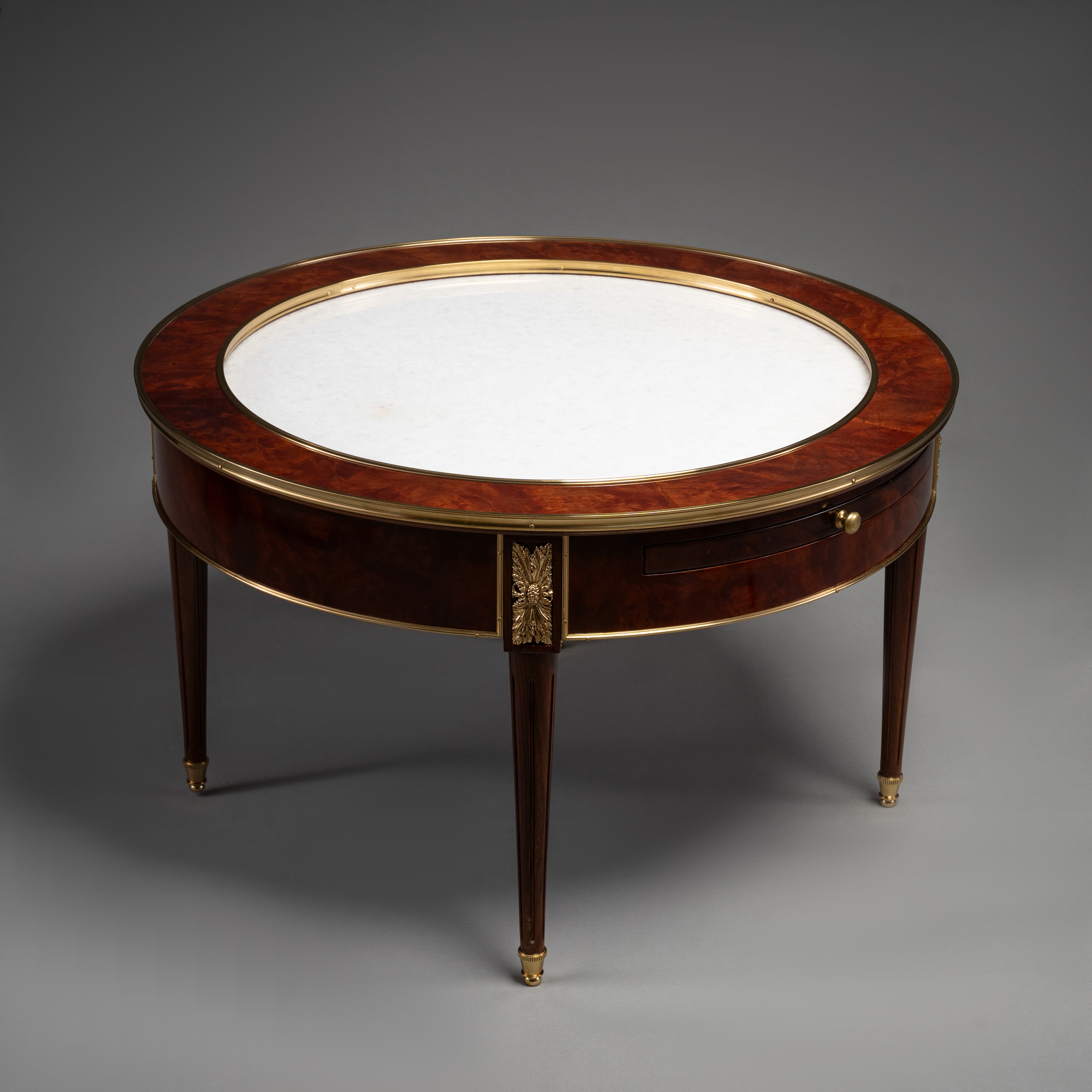 Empire Style Circular Mahogany Table with Brass Trim and Hidden Drawer
