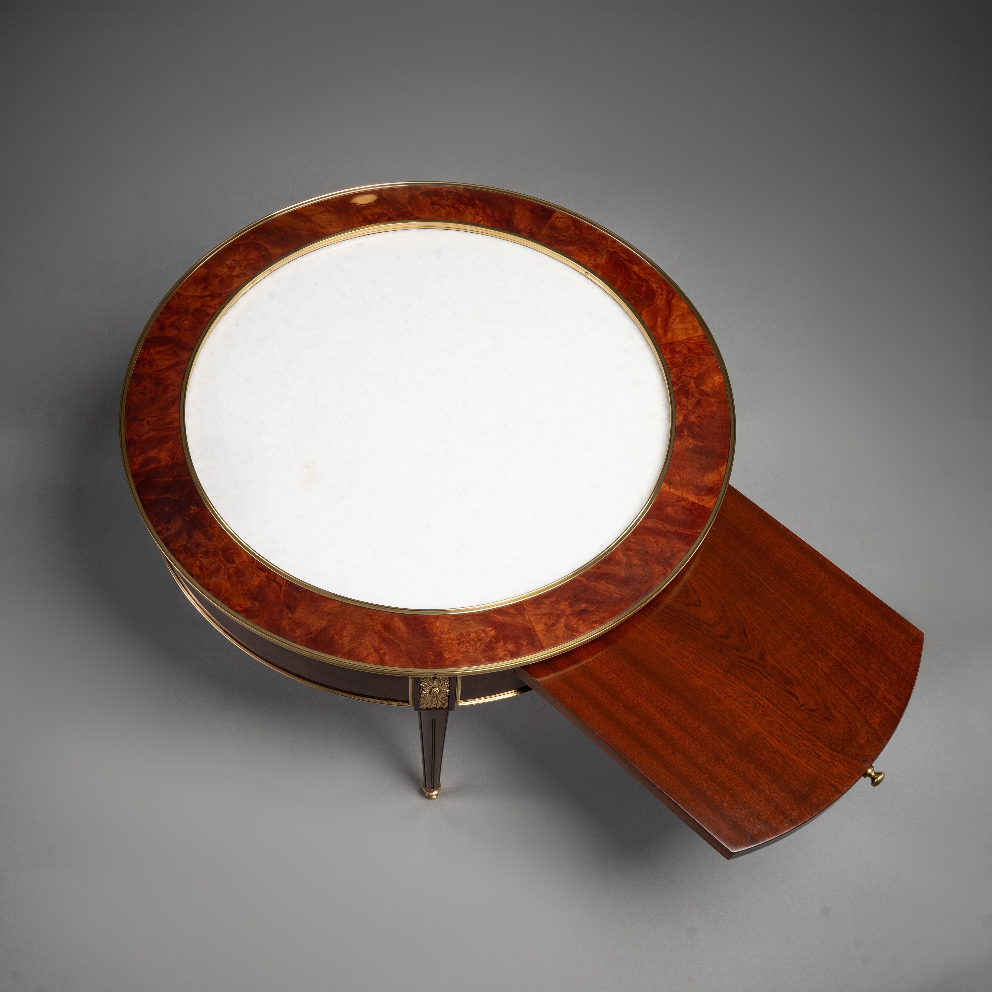 Empire Style Circular Mahogany Table with Brass Trim and Hidden Drawer