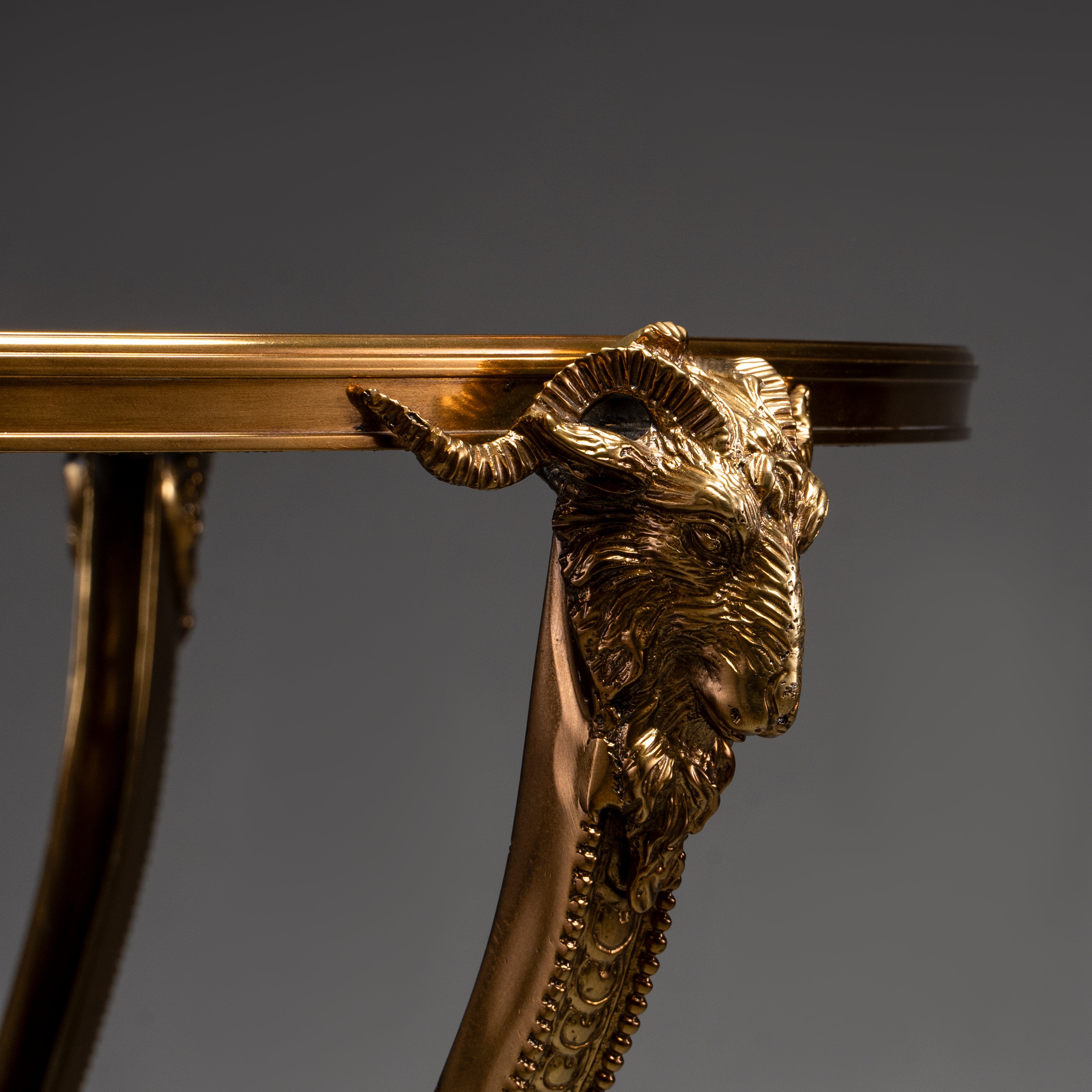 Elegant Round Side Table with Marble Top and Brass Ram Head Motifs