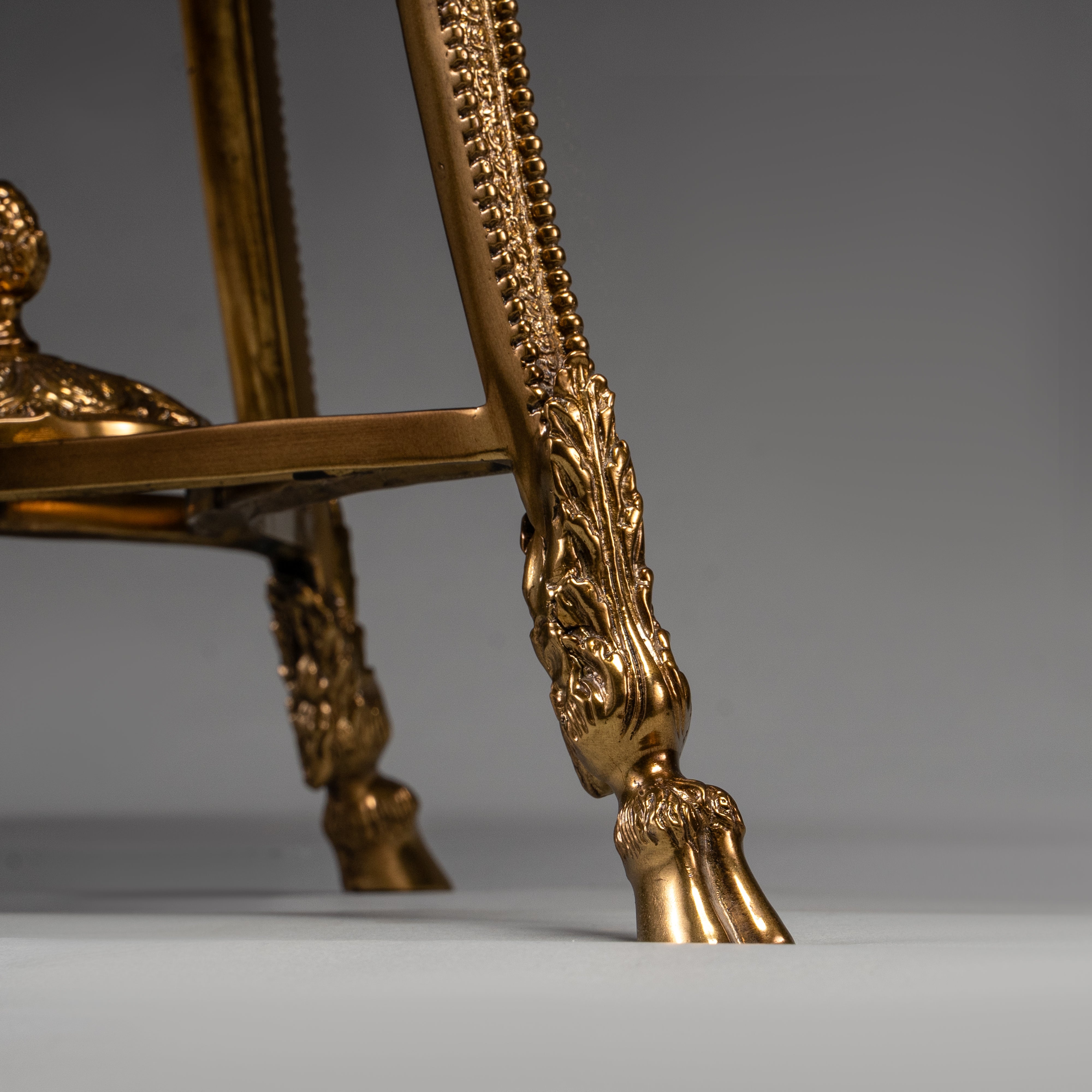 Elegant Round Side Table with Marble Top and Brass Ram Head Motifs