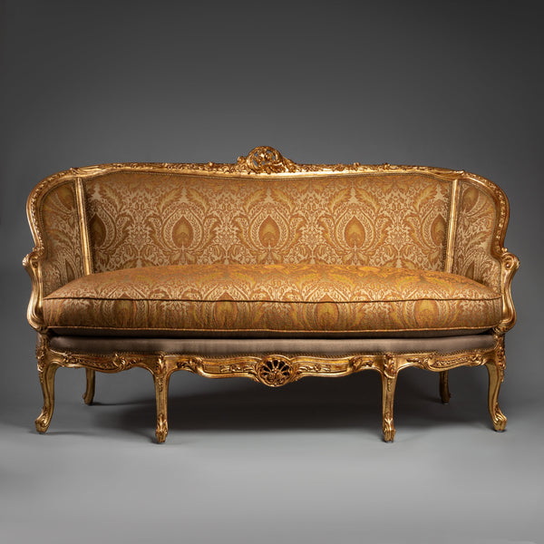 Ornate Louis XV-Style Sofa with Gilded Frame and Brocade Upholstery