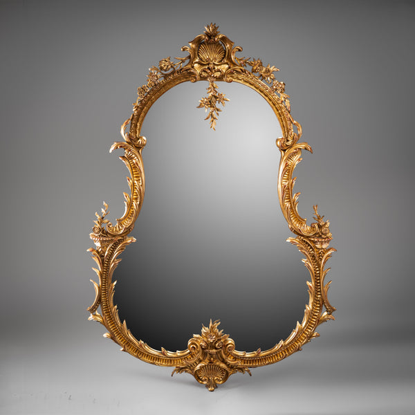 Rococo Style Giltwood Mirror with Floral and Scroll Motifs