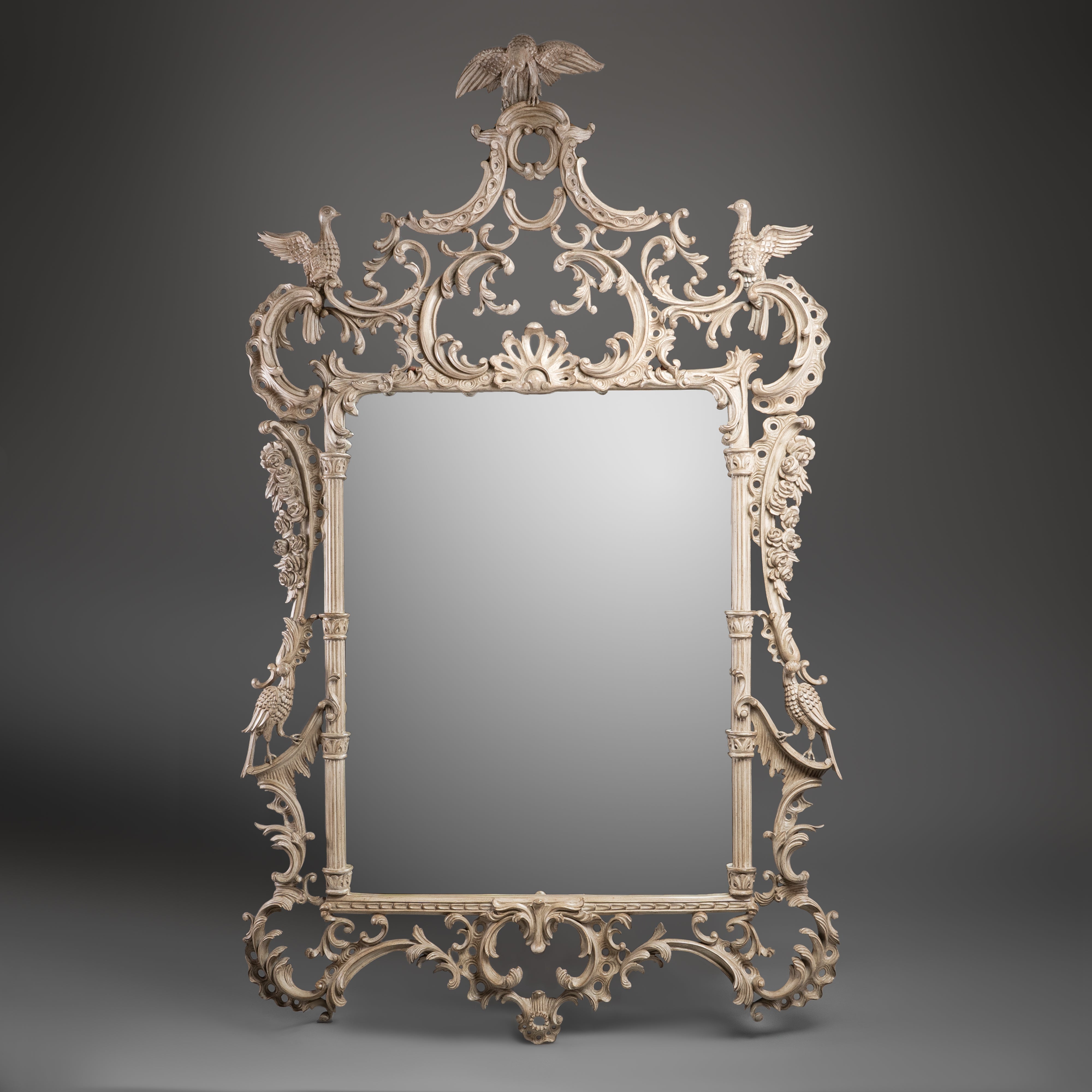 Ornate Carved Ivory-Tone Mirror with Bird and Foliage Motifs