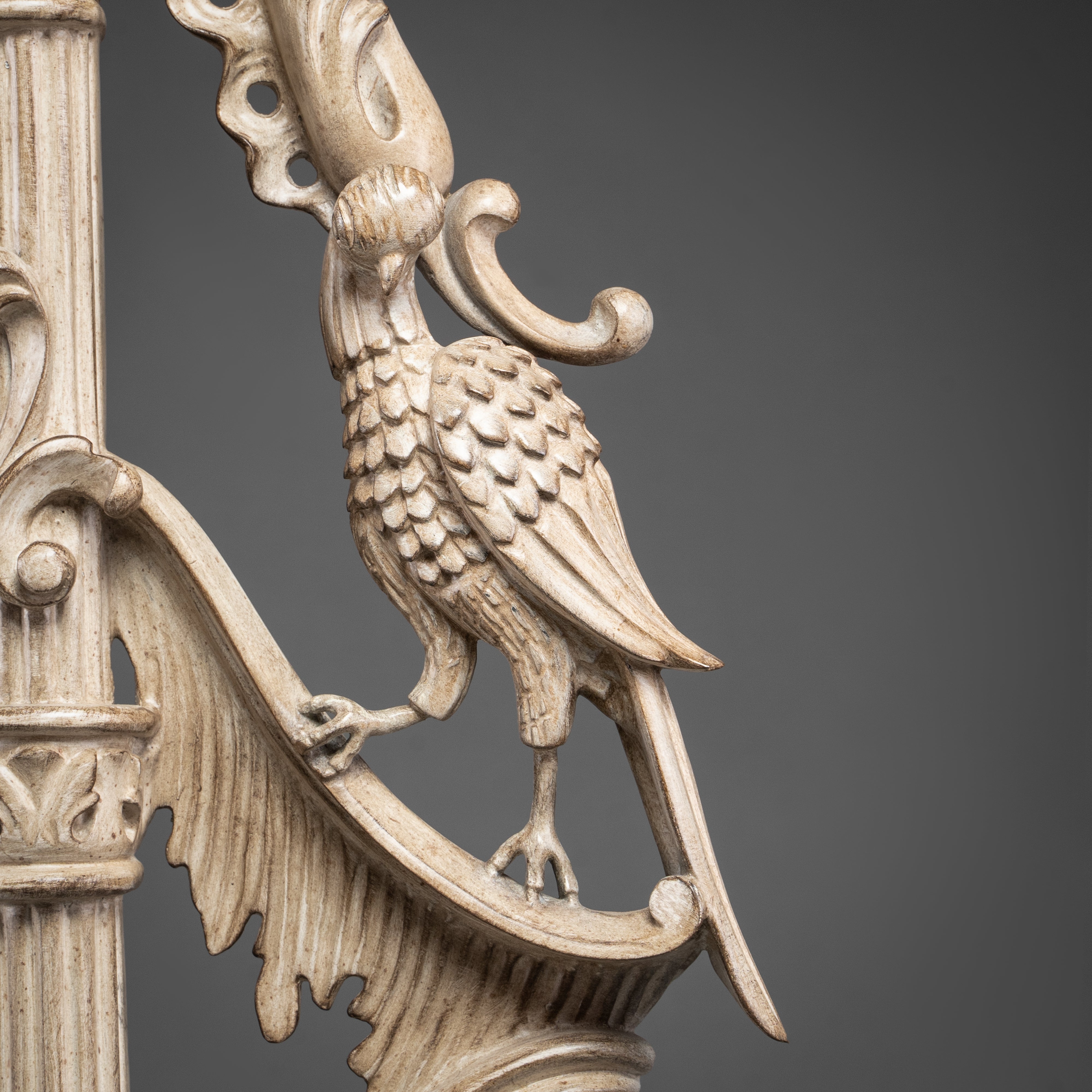 Ornate Carved Ivory-Tone Mirror with Bird and Foliage Motifs