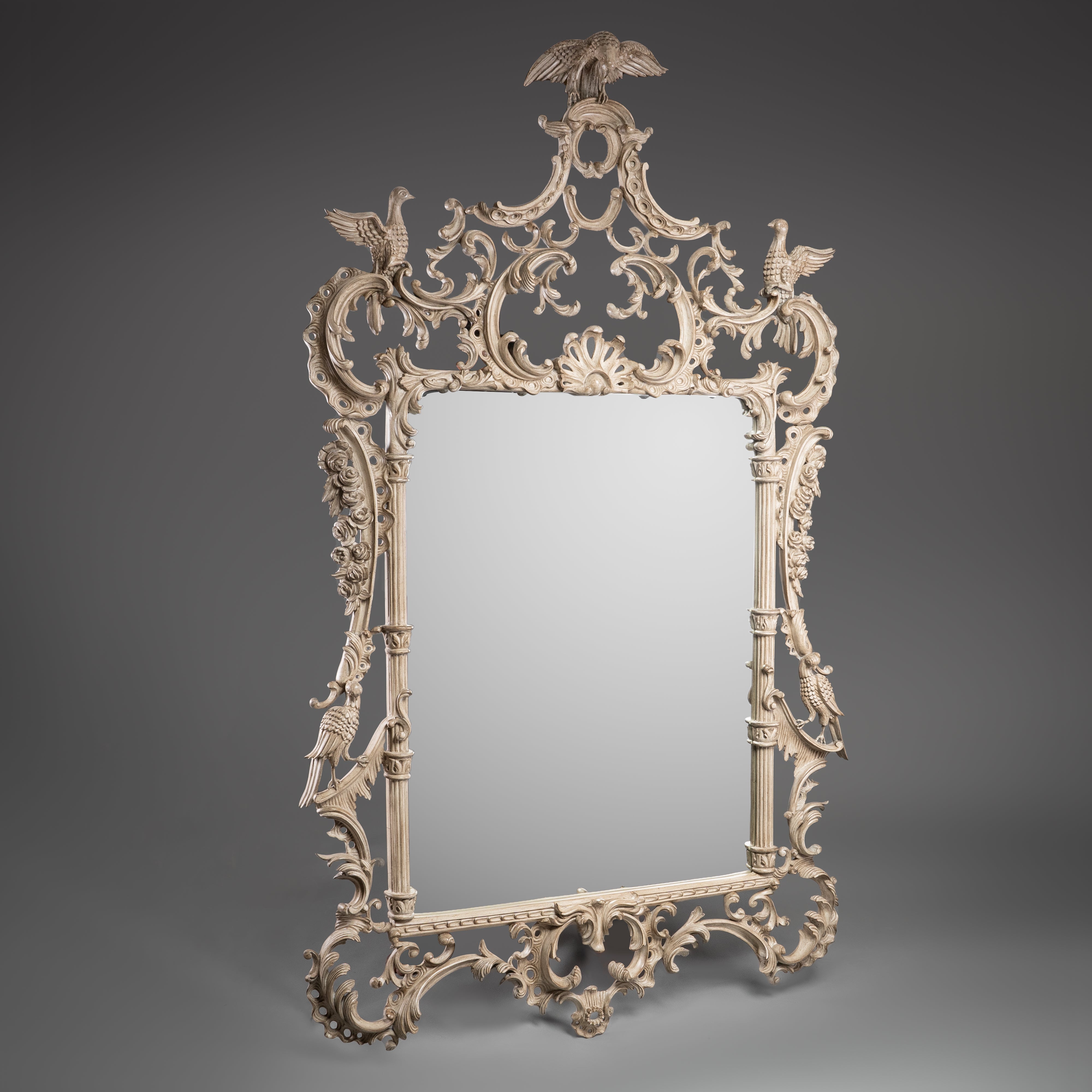 Ornate Carved Ivory-Tone Mirror with Bird and Foliage Motifs