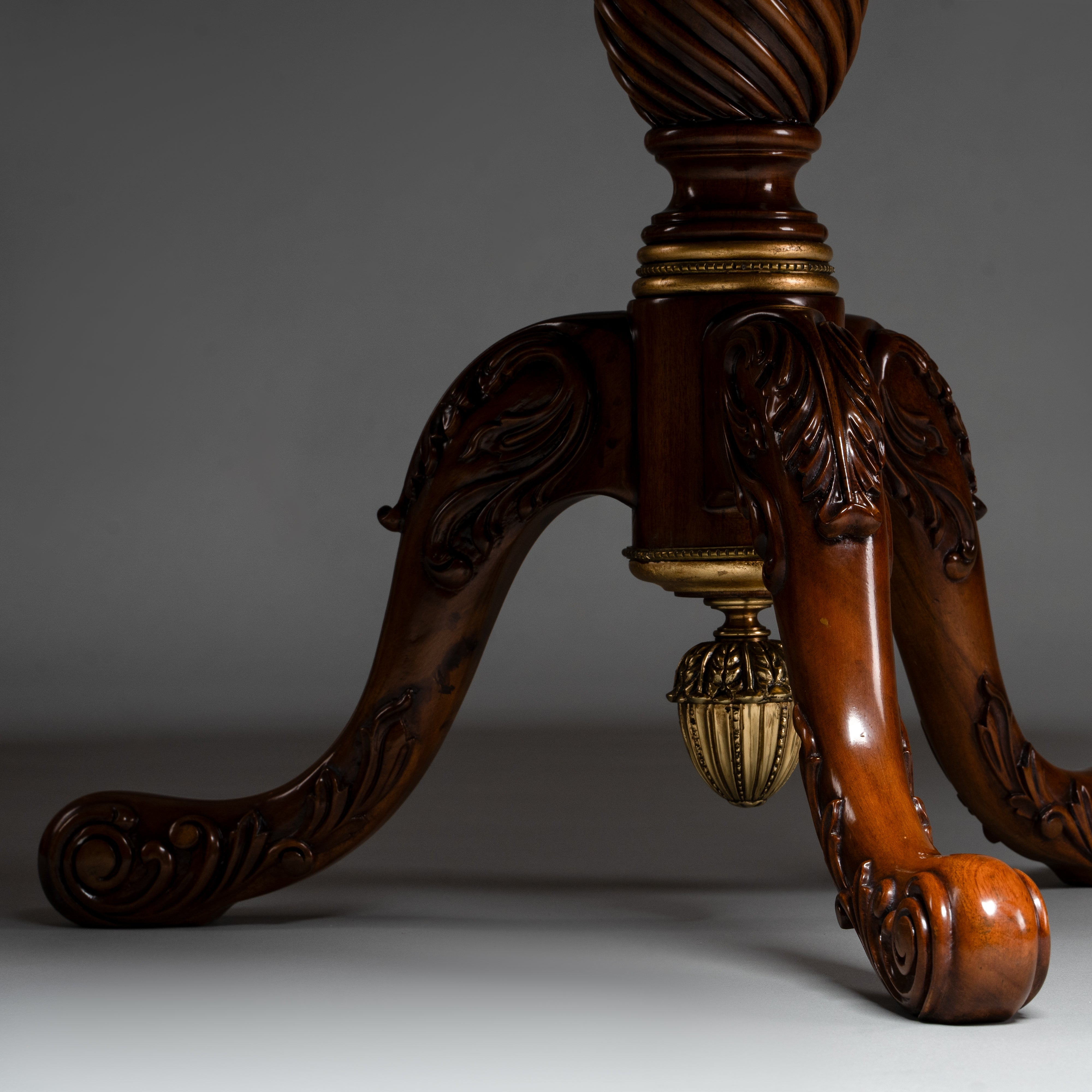 Regency Style Oval Center Table with Carved Pedestal and Brass Ornaments