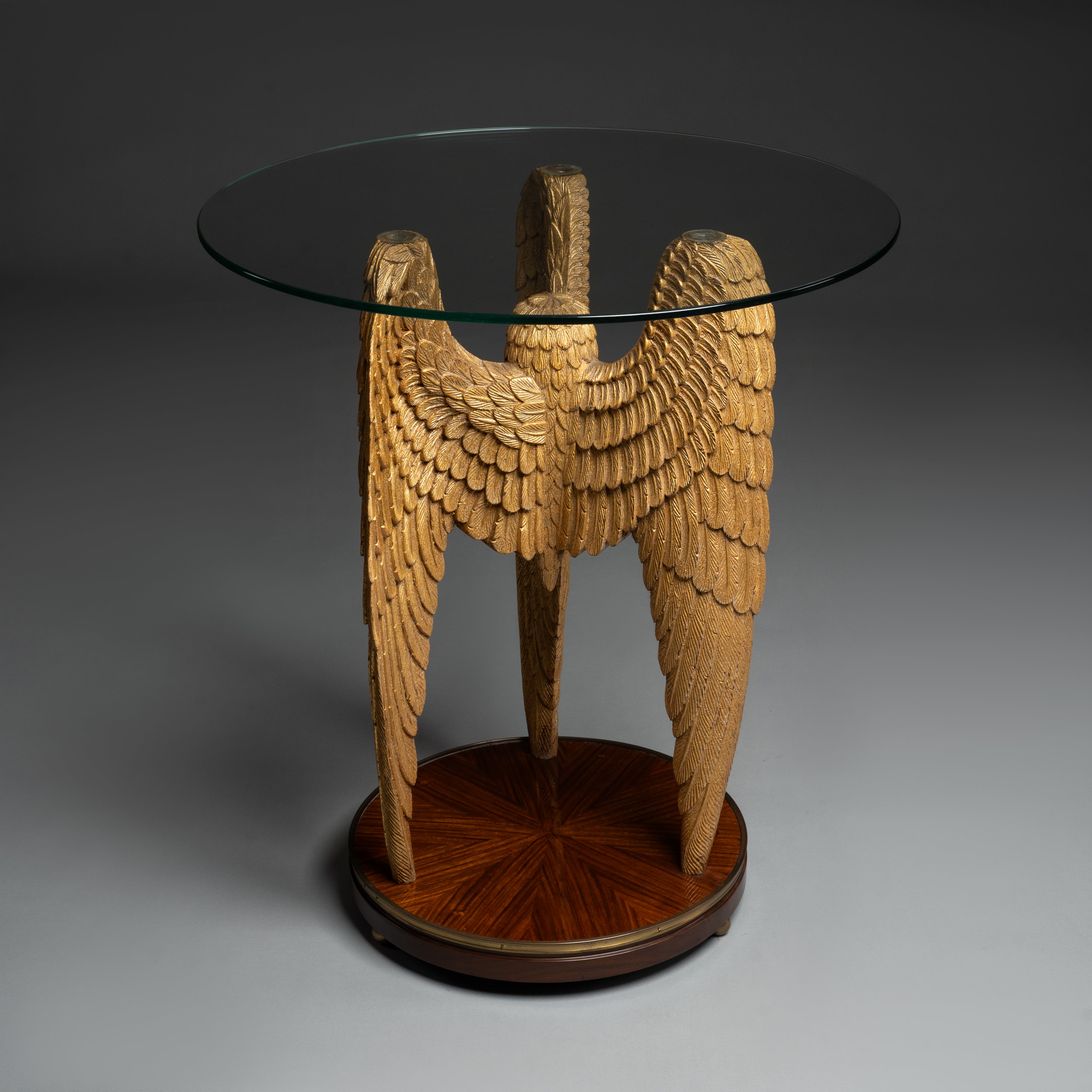 Round Glass-Top Side Table with Ornate Carved Gilded Wings