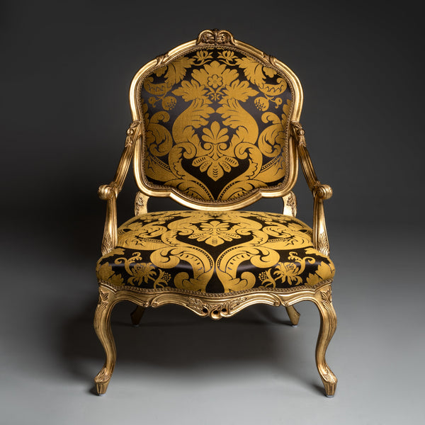 Baroque-Style Gilded Armchair with Black and Gold Damask Upholstery