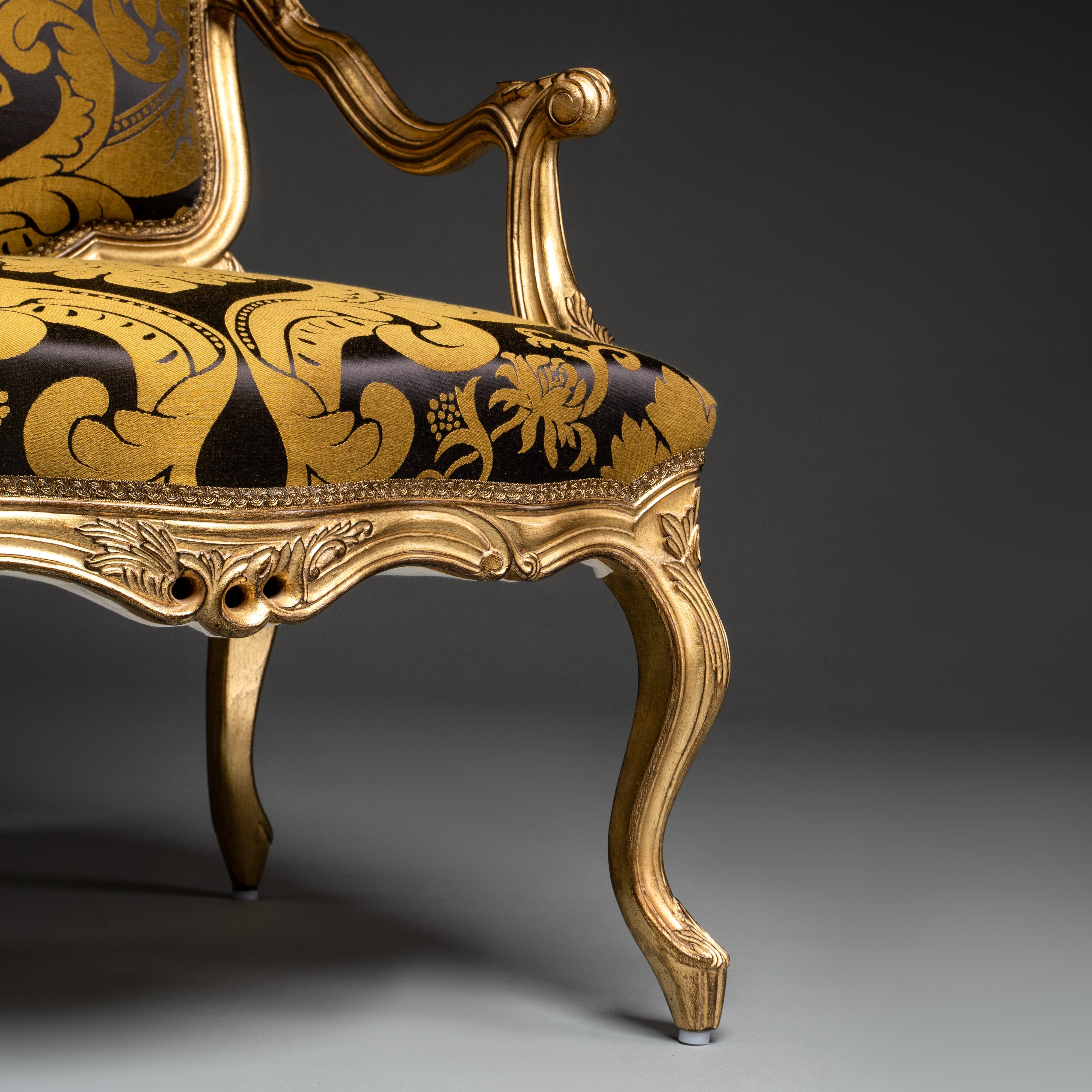 Baroque-Style Gilded Armchair with Black and Gold Damask Upholstery