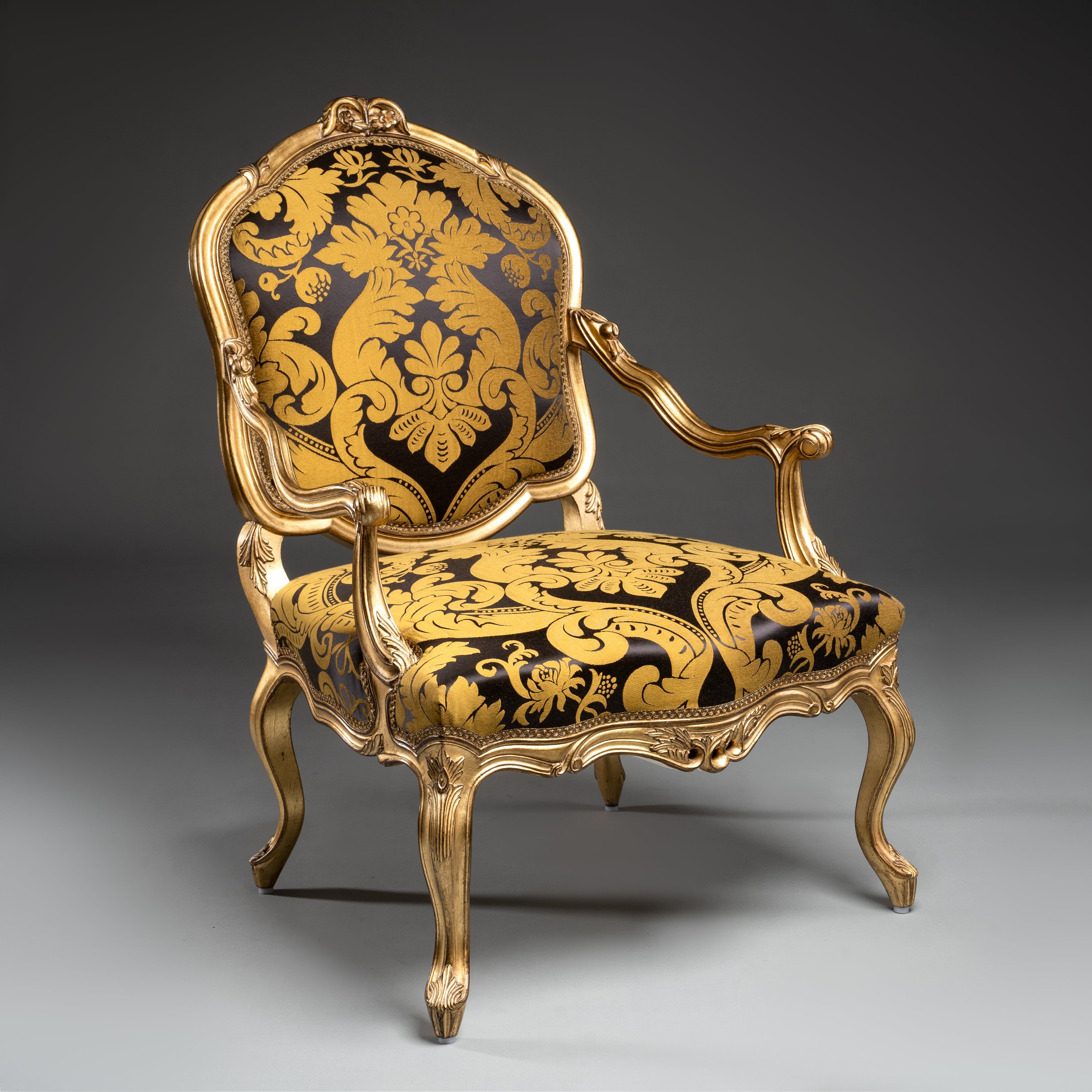 Baroque-Style Gilded Armchair with Black and Gold Damask Upholstery