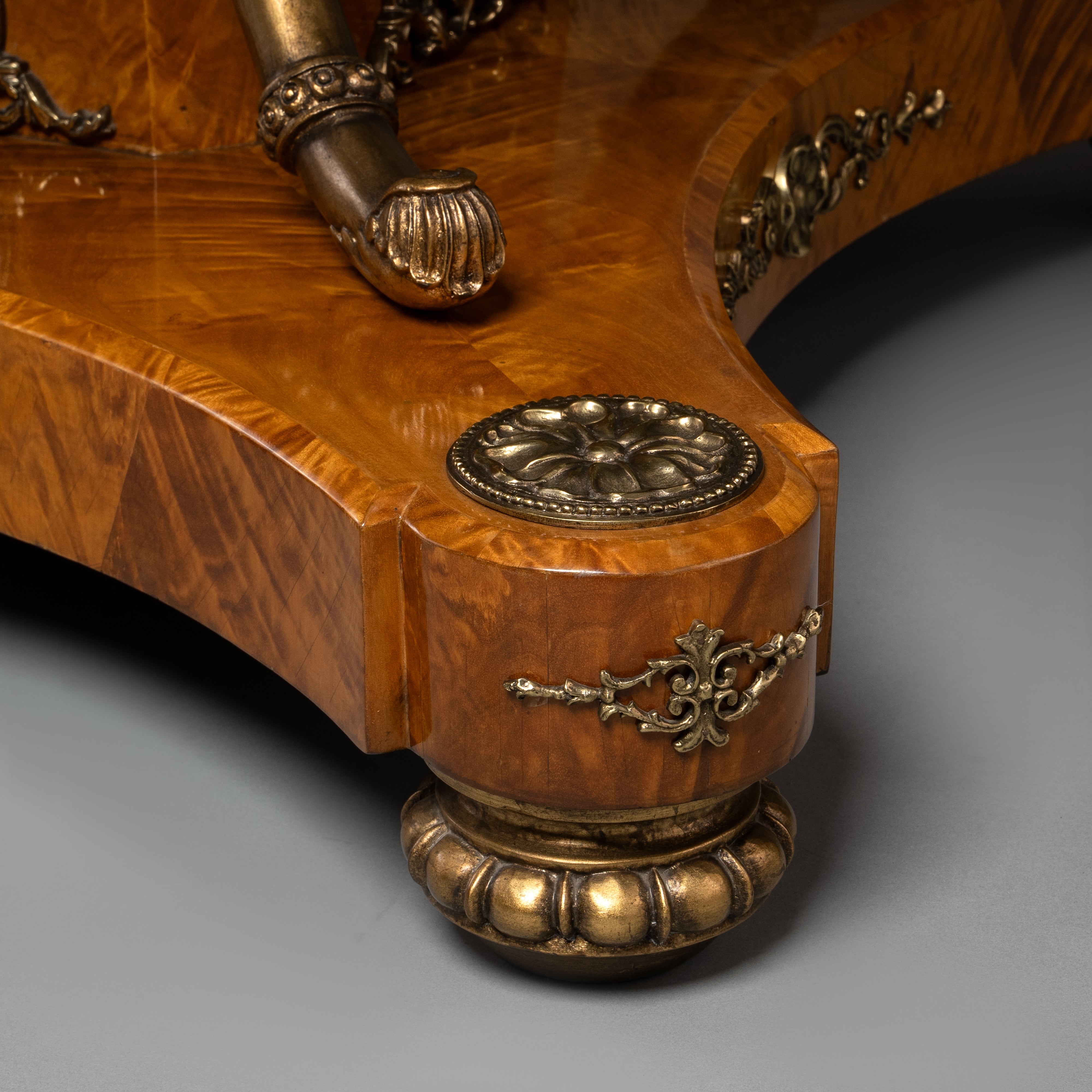 Regency Style Round Table with Inlaid Burl Wood and Ornate Brass Accents