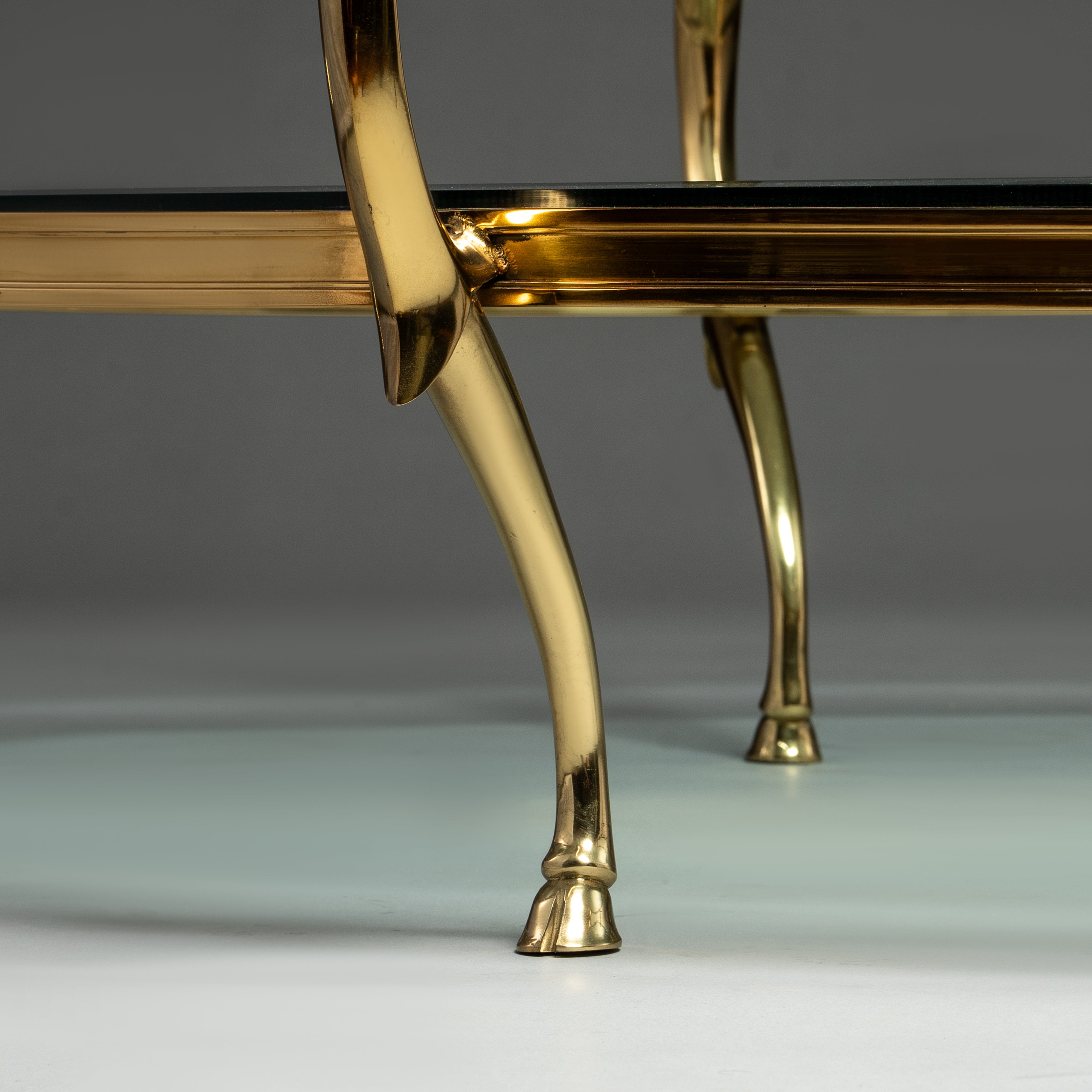 Mid-Century Brass and Glass Coffee Table with Horse Head Details
