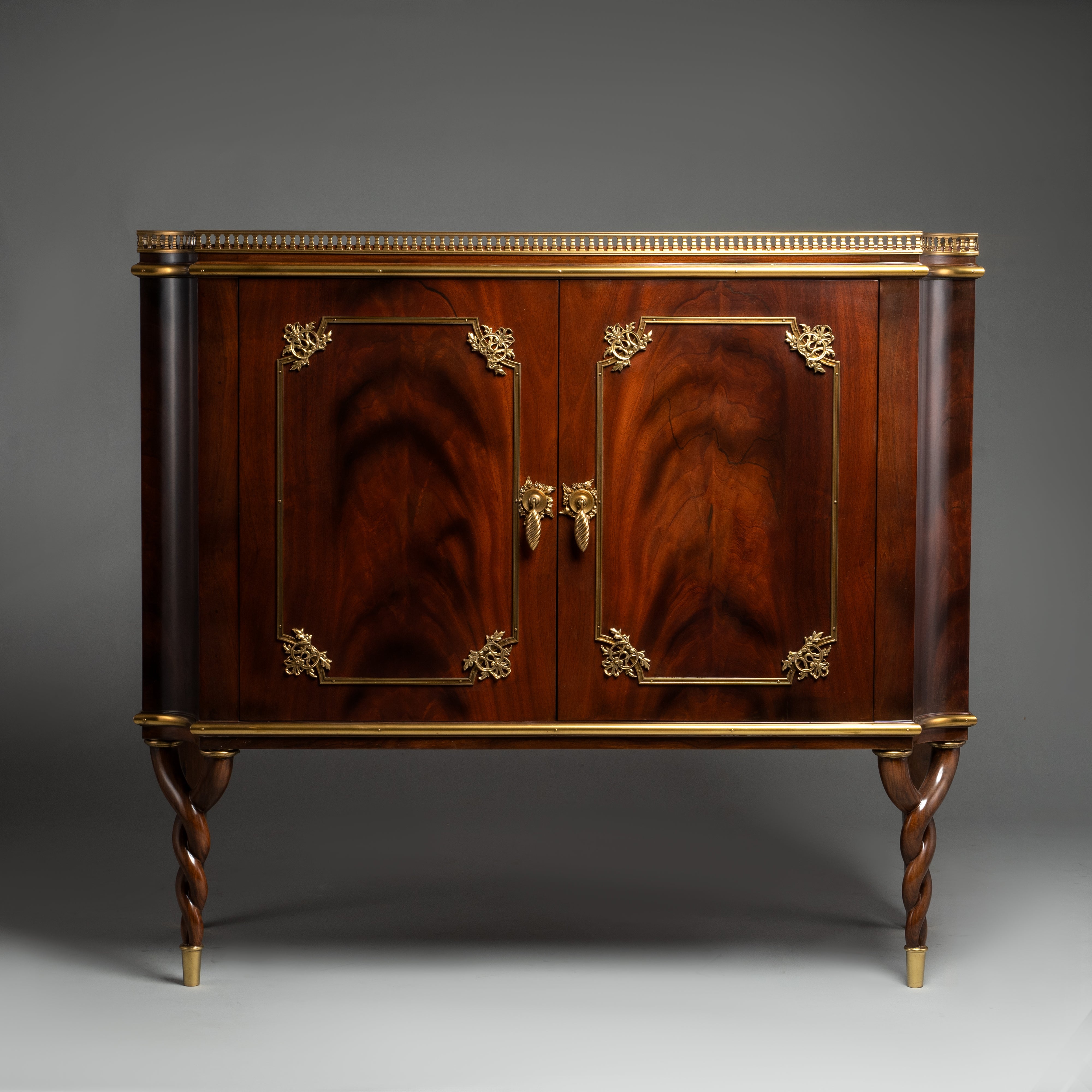 Louis XVI Style Mahogany Cabinet with Brass Detailing and Twisted Legs