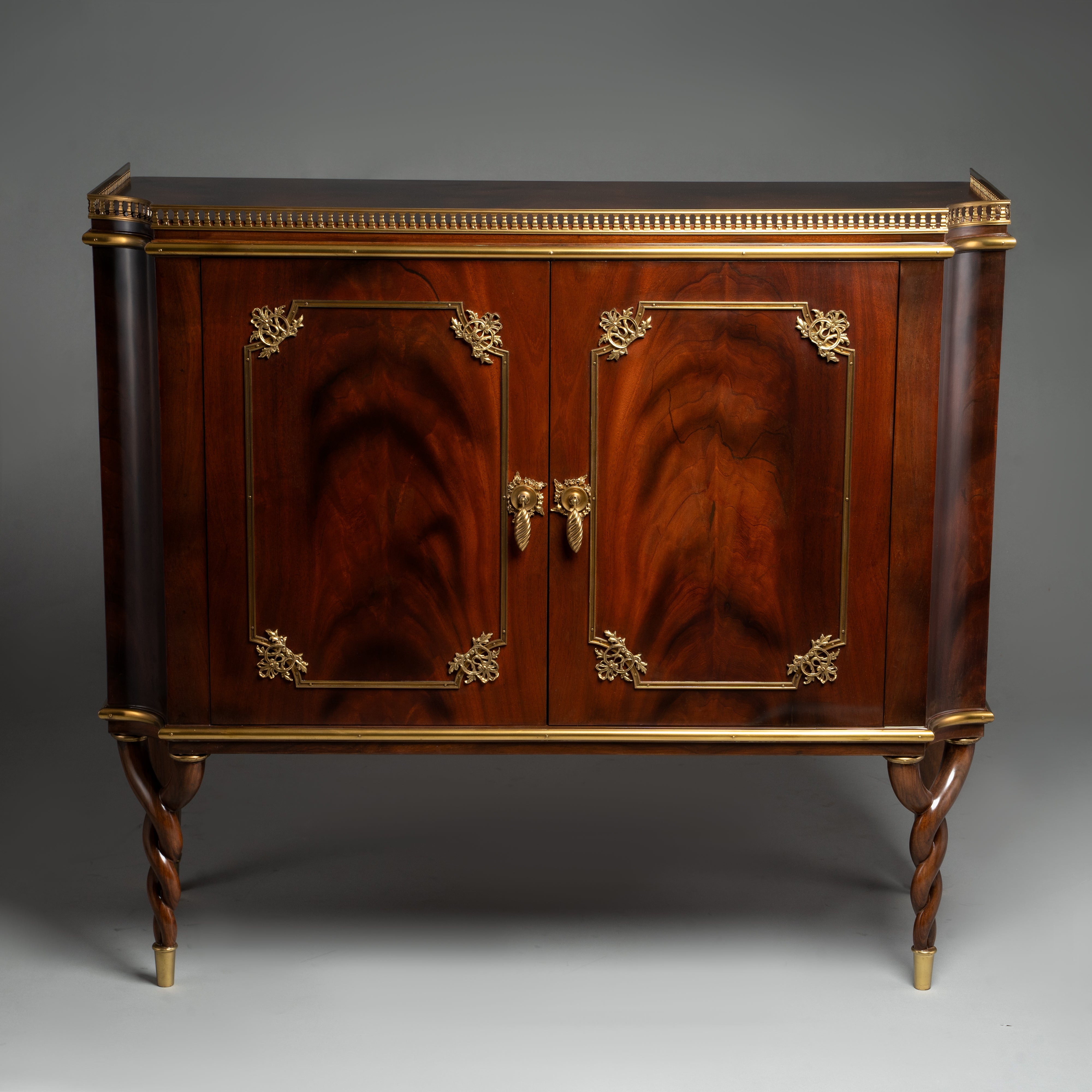 Louis XVI Style Mahogany Cabinet with Brass Detailing and Twisted Legs