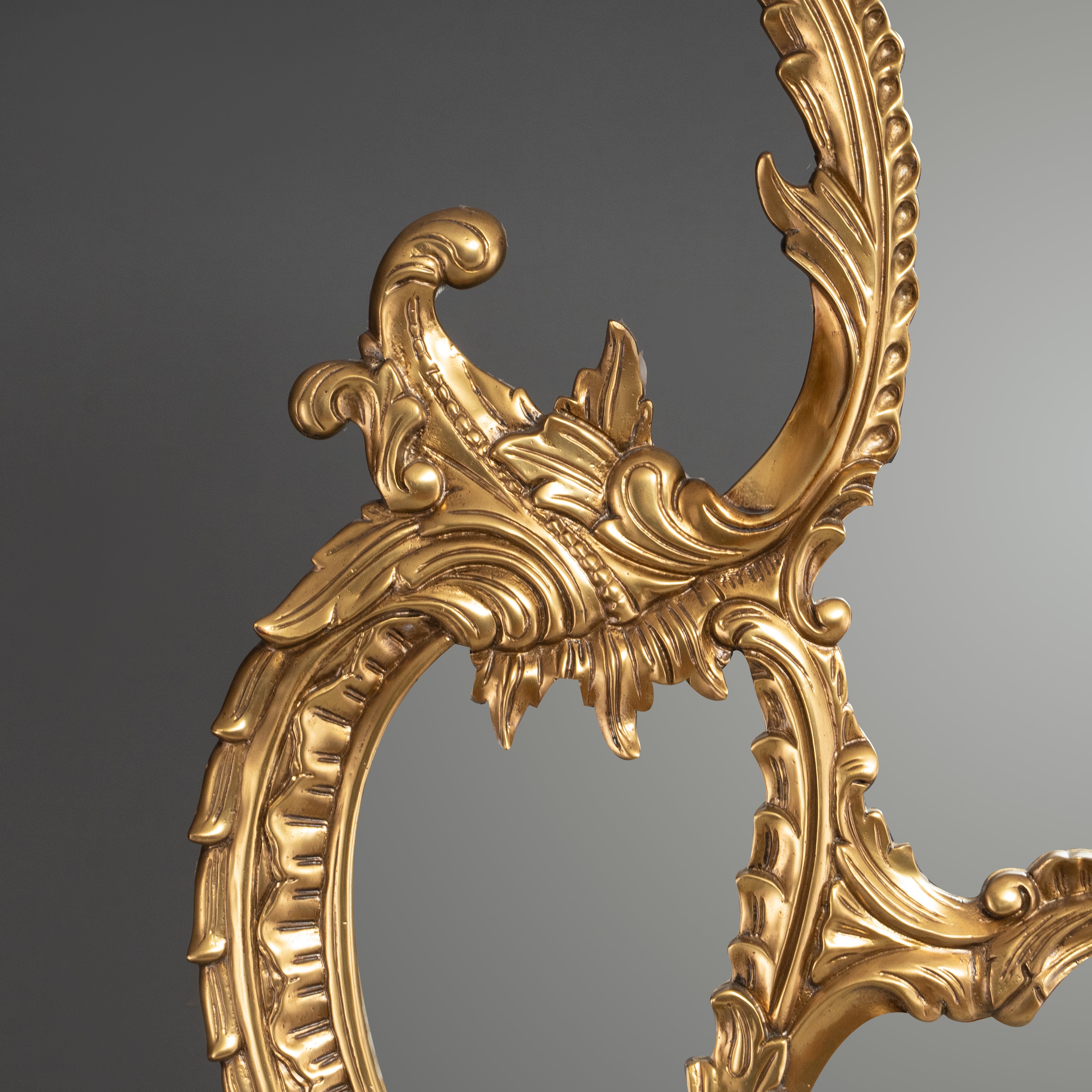 Regal Rococo-Style Brass Mirror