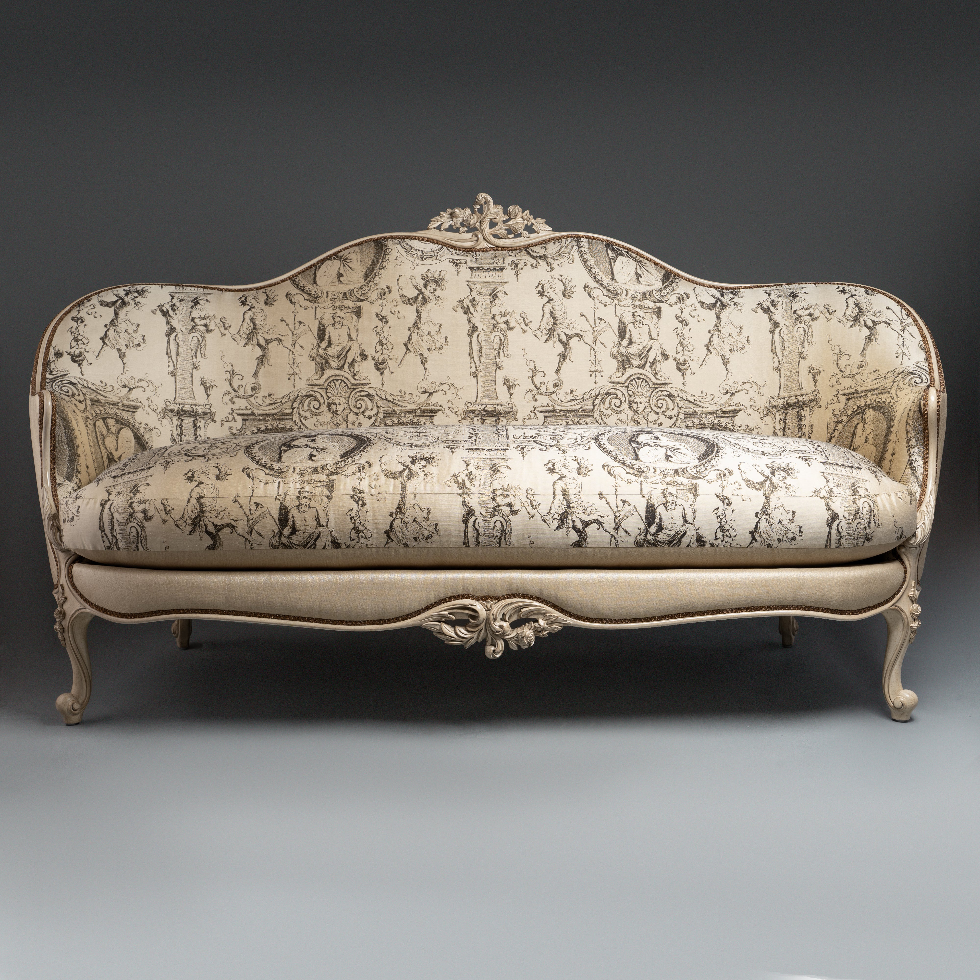 Louis XV-Style Sofa with Intricate Toile  Upholstery and Ornate Carved Detailing
