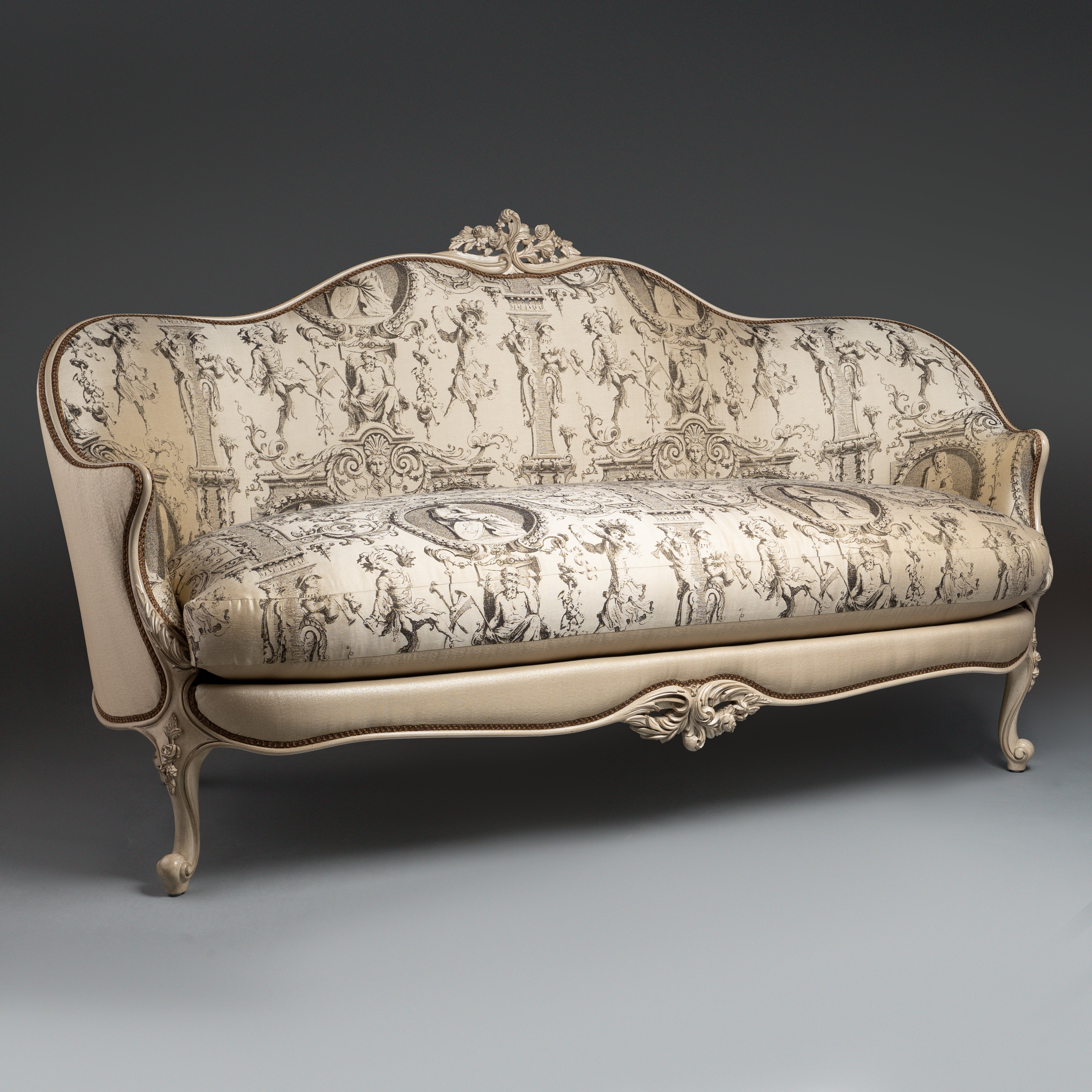 Louis XV-Style Sofa with Intricate Toile  Upholstery and Ornate Carved Detailing