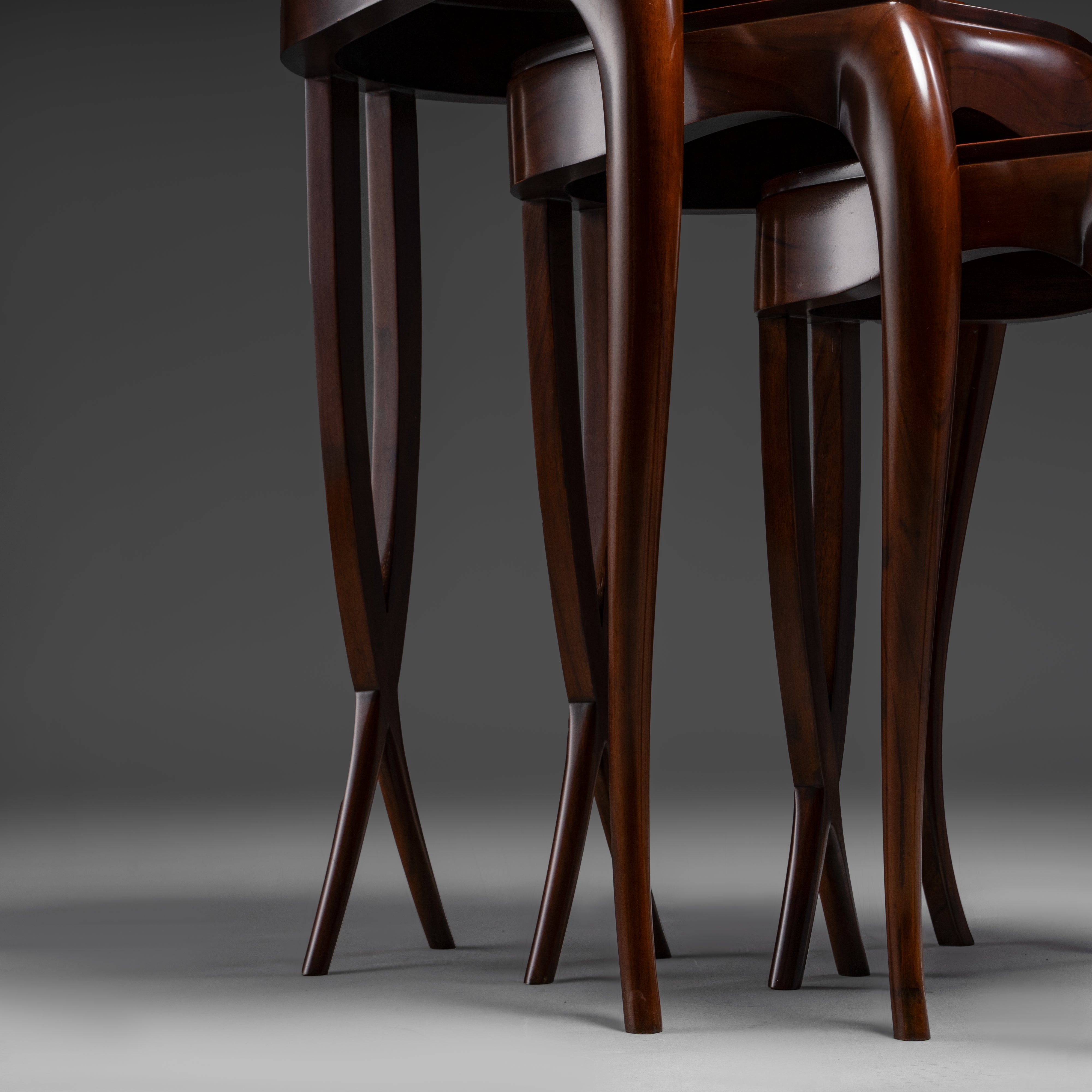 Exquisite Nesting Table Set with Flowing  Silhouette and Lustrous Finish