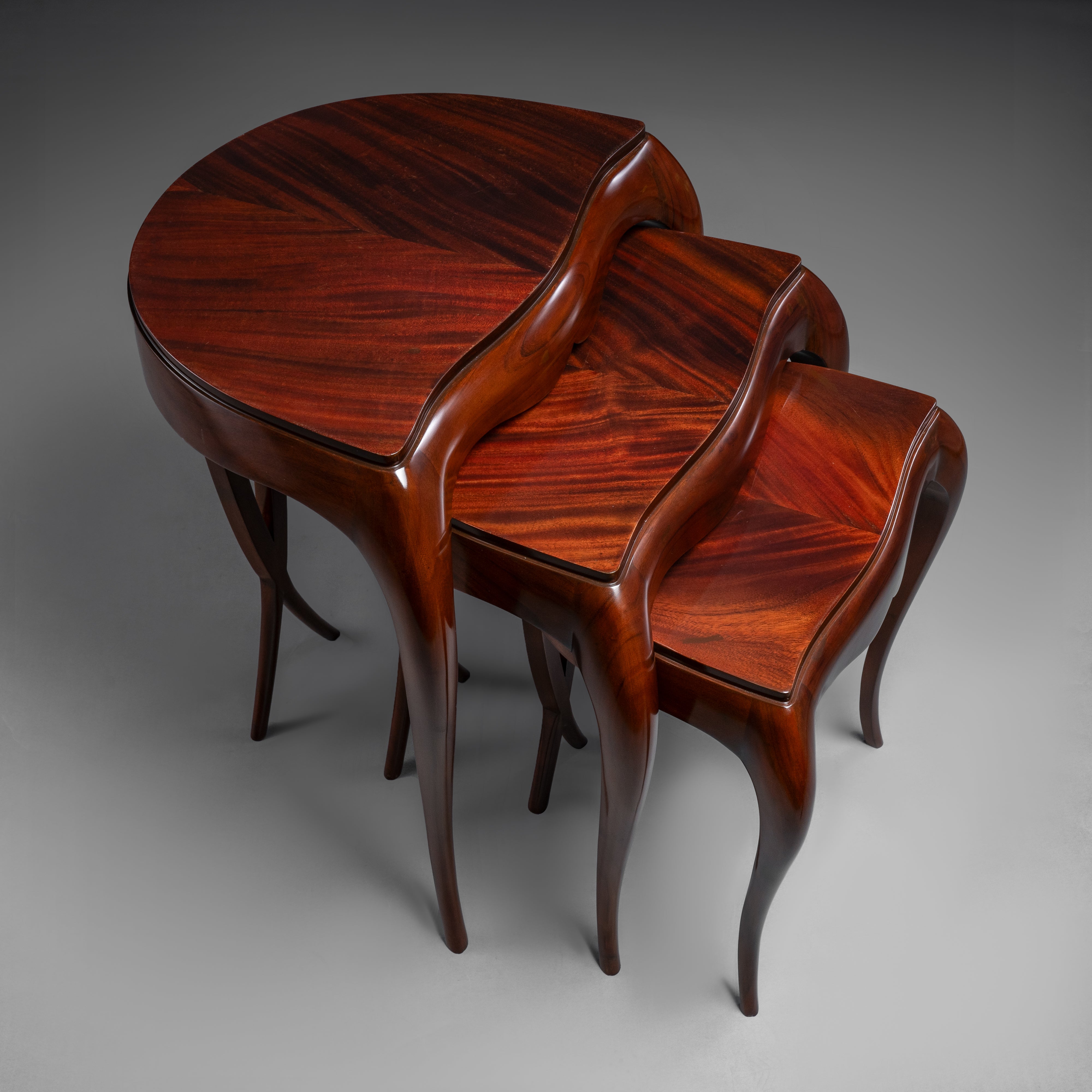Exquisite Nesting Table Set with Flowing  Silhouette and Lustrous Finish
