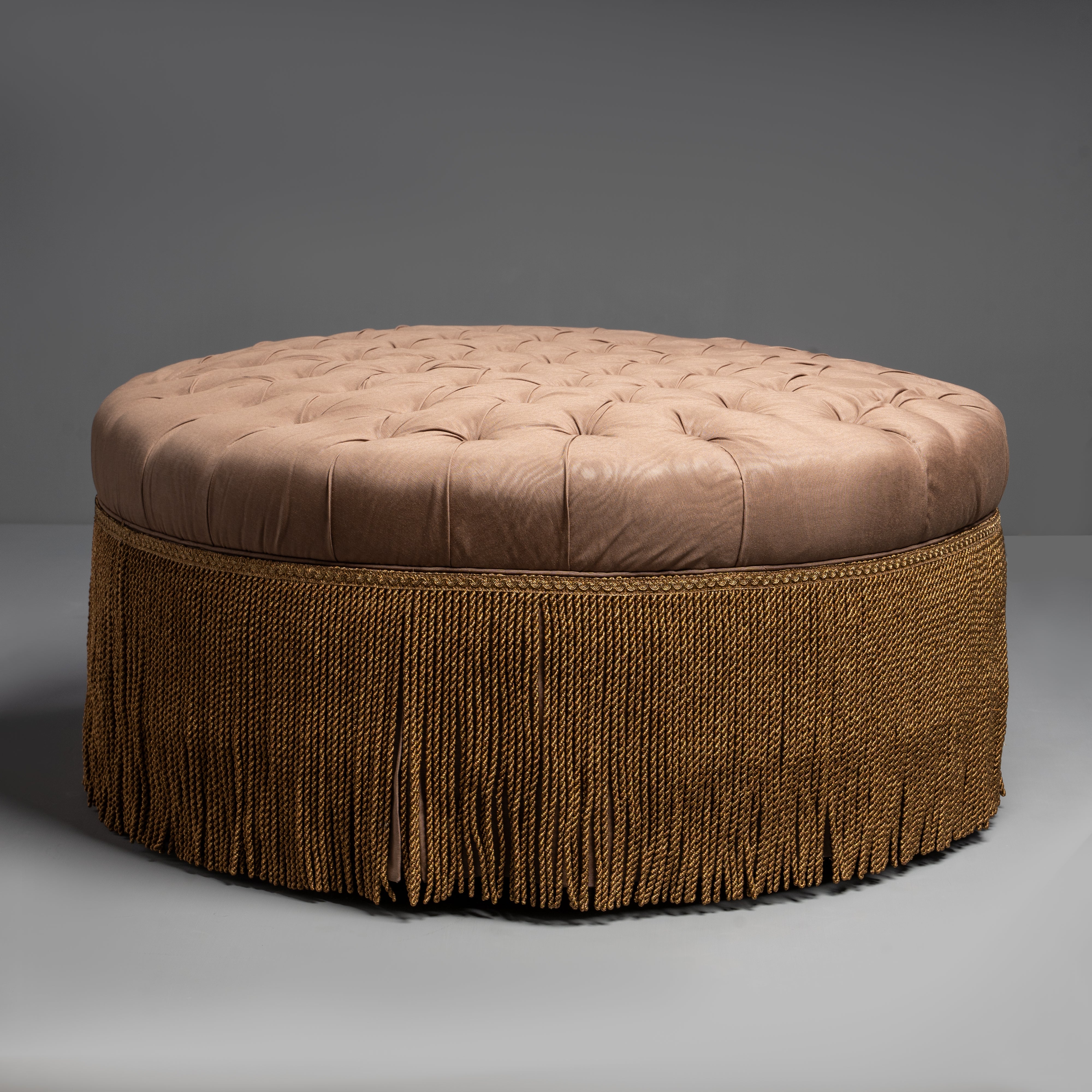 Luxurious Tufted Round Ottoman with  Elegant Fringe Detail