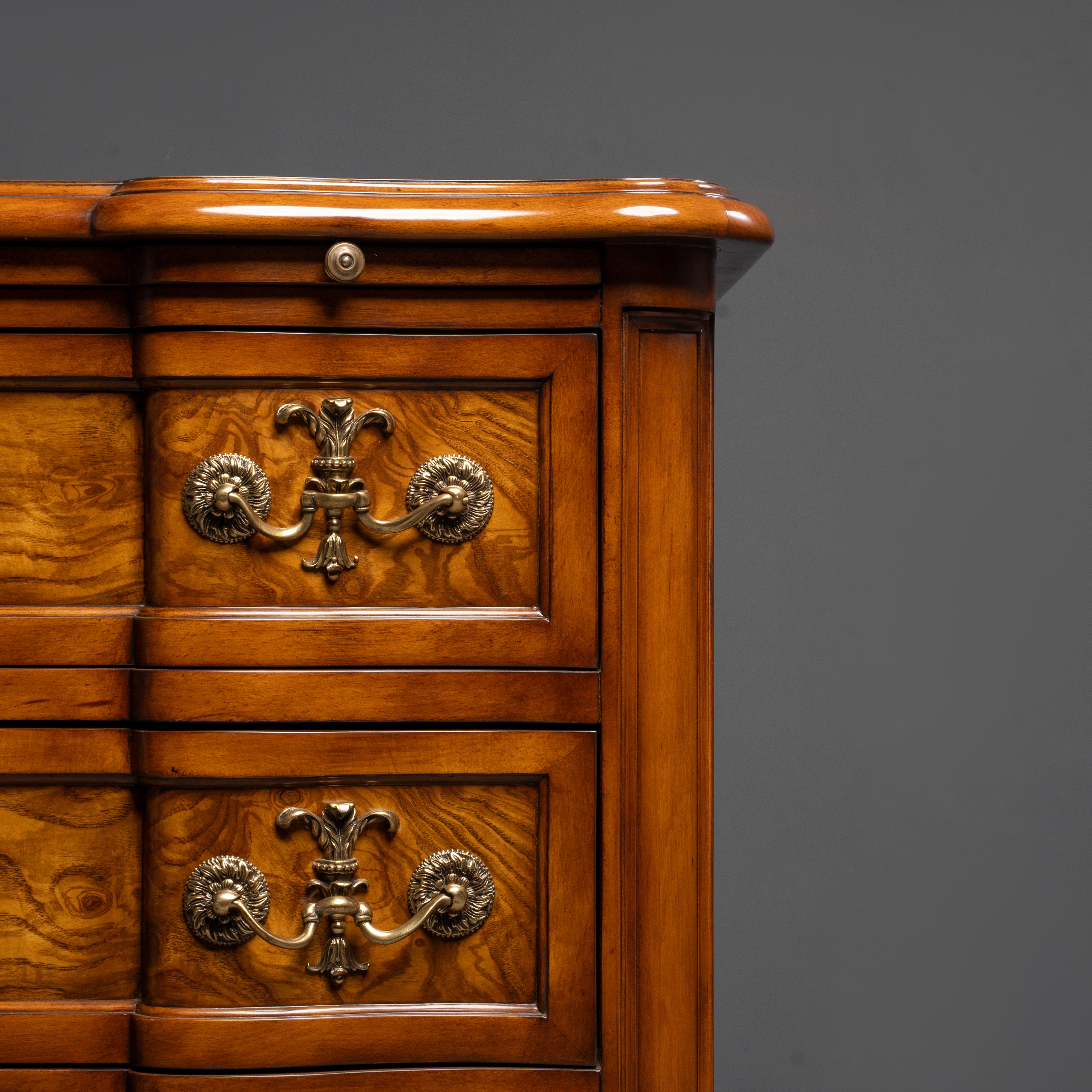 Elegant Three-Drawer Commode with Ornate  Brass Hardware
