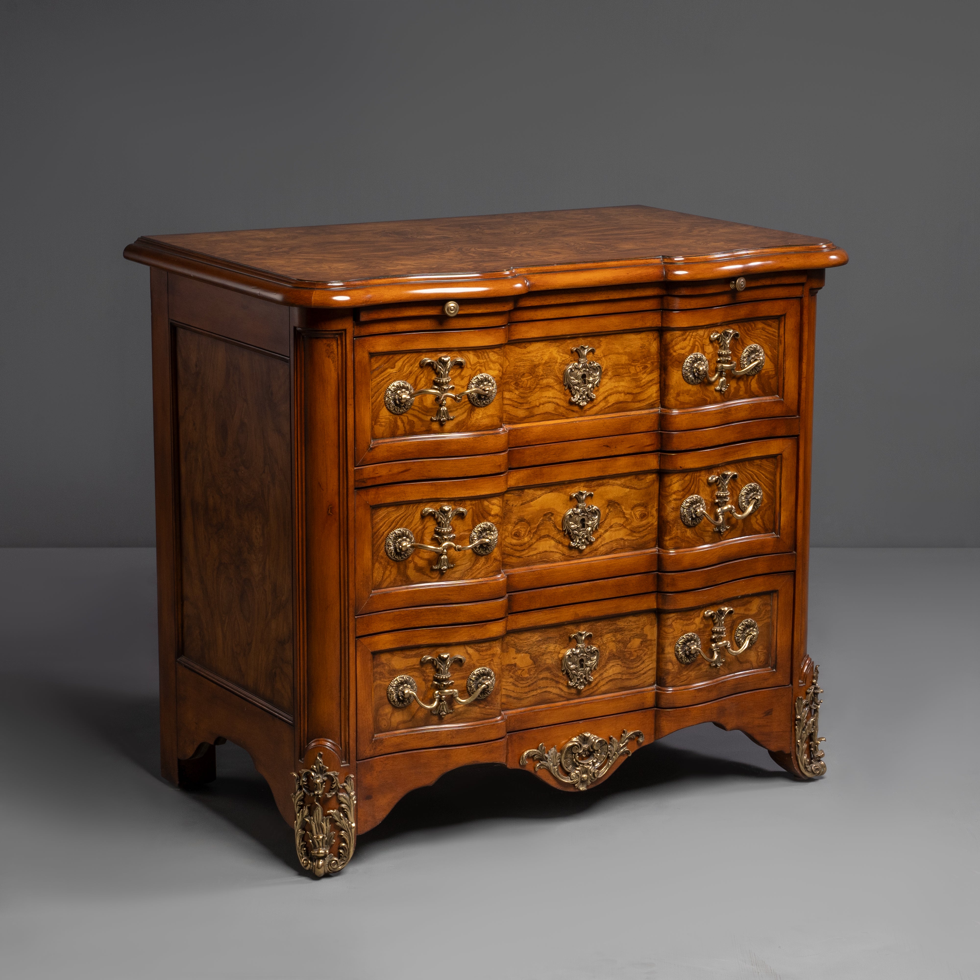 Elegant Three-Drawer Commode with Ornate  Brass Hardware