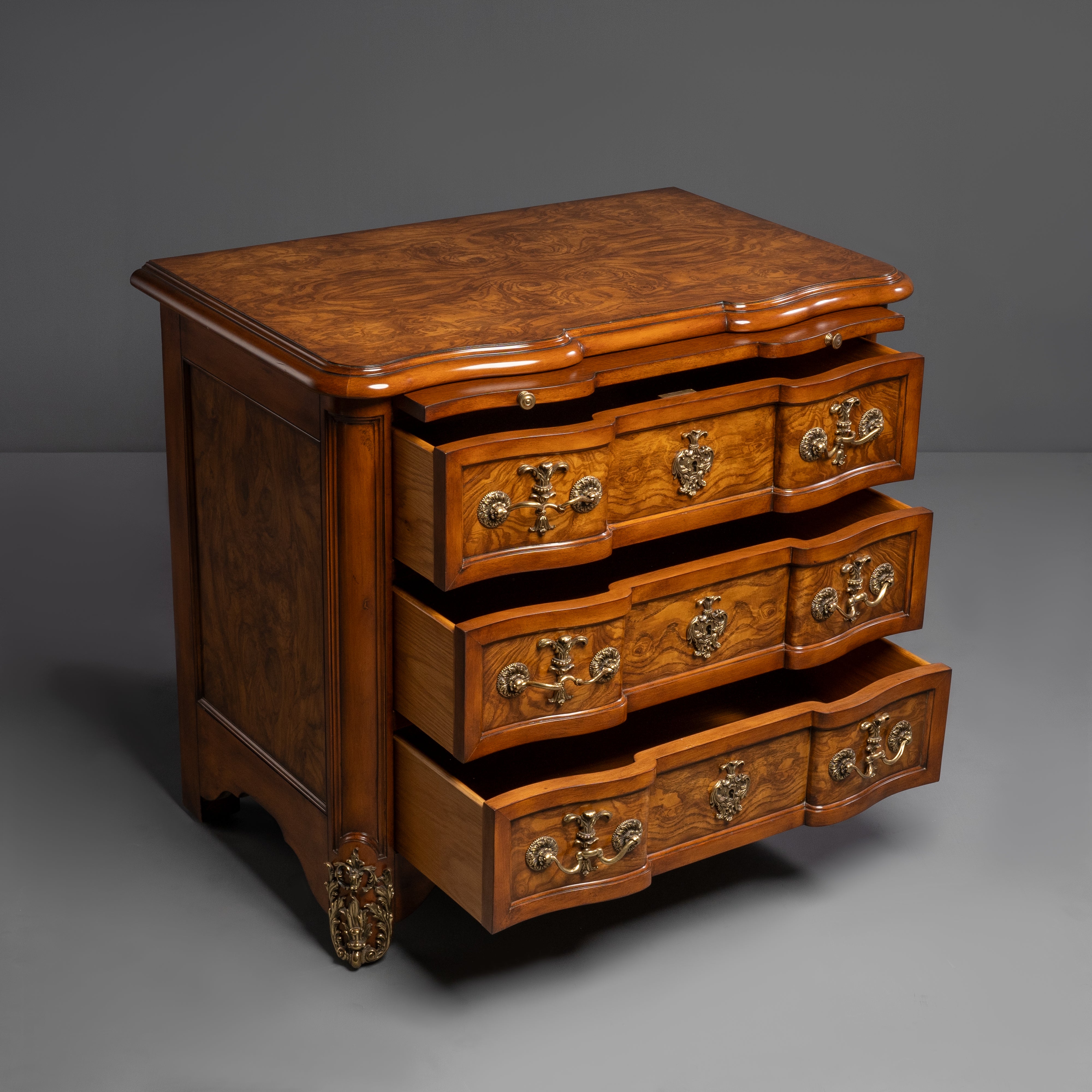 Elegant Three-Drawer Commode with Ornate  Brass Hardware