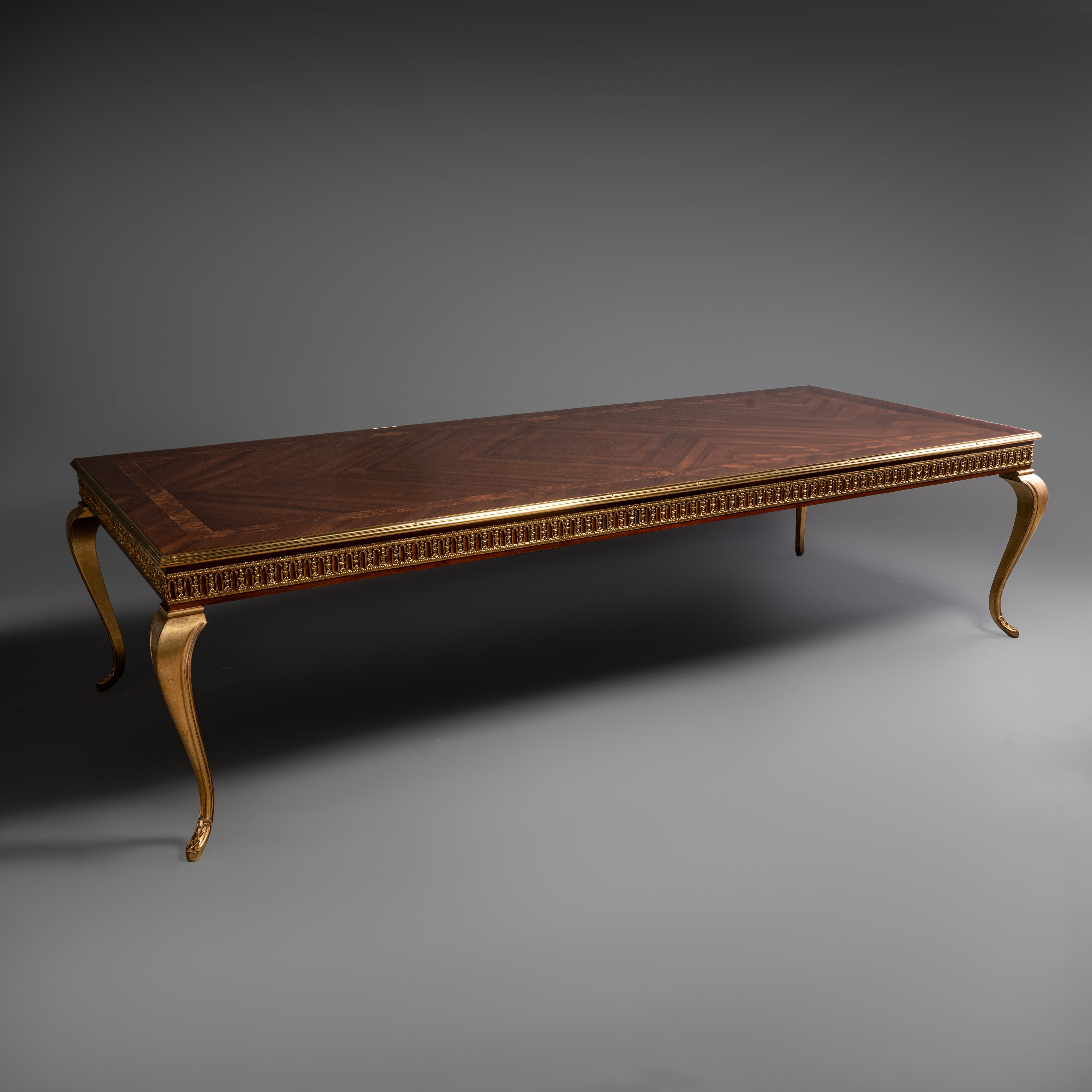 Elegant French-Style Giltwood Dining Table  with Veneer Top and Brass Motif