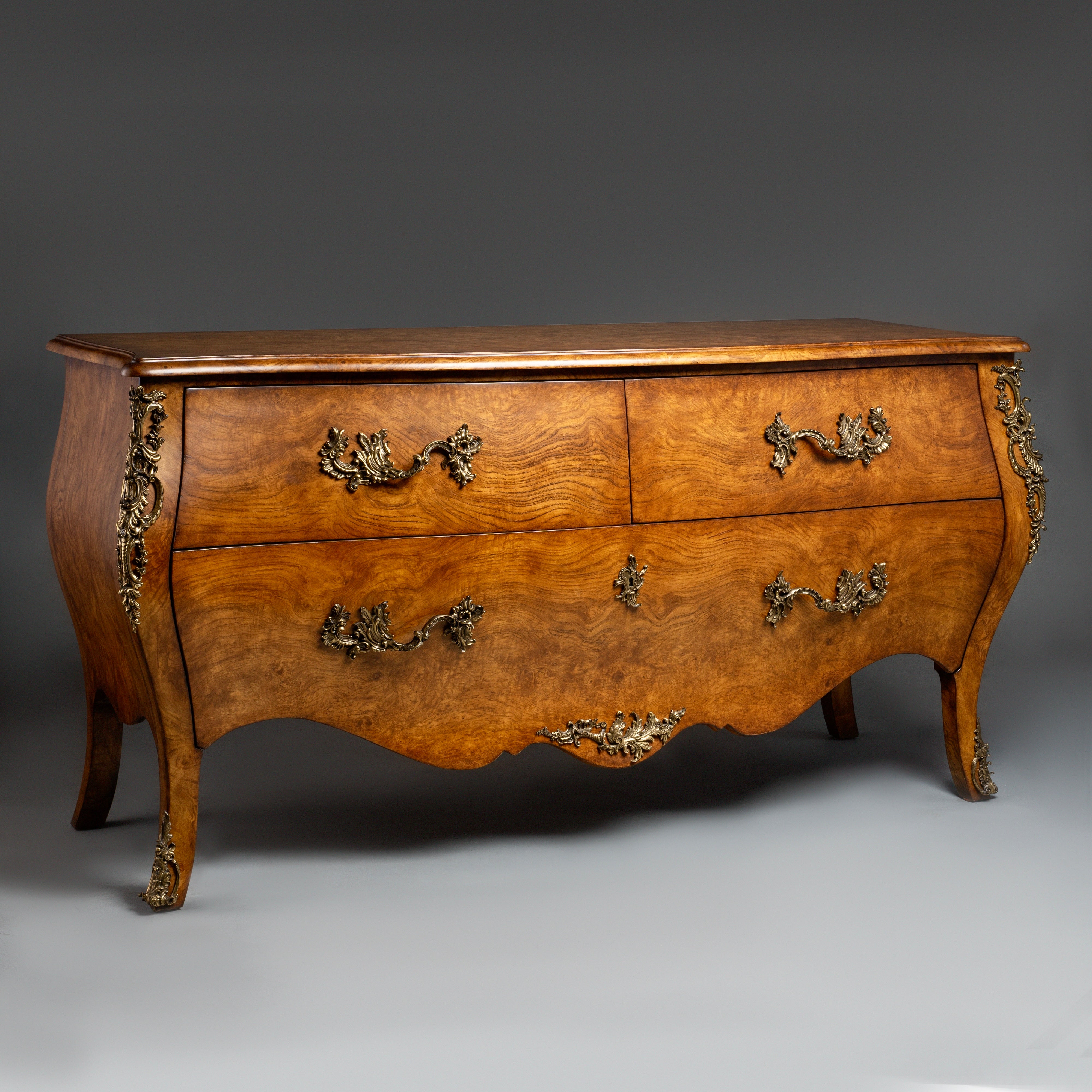 Louis XV-Style Bombe Chest with Veneer and  Ornate Brass Hardware