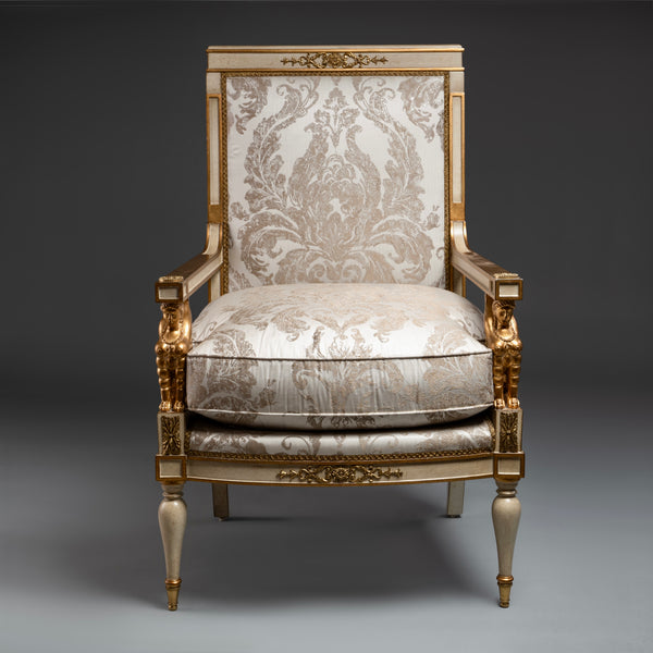 Louis XVI Style Armchair with Gilded Sphinx  Armrests and Ornate Upholstery